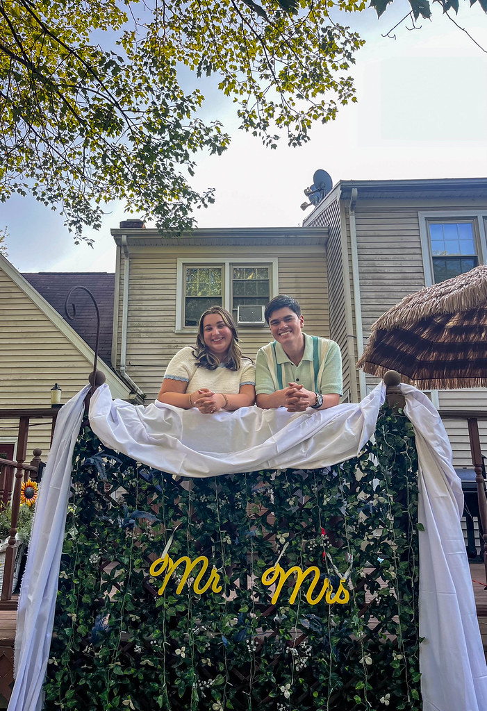 Shannen & David behind the Mr & Mrs backdrop
